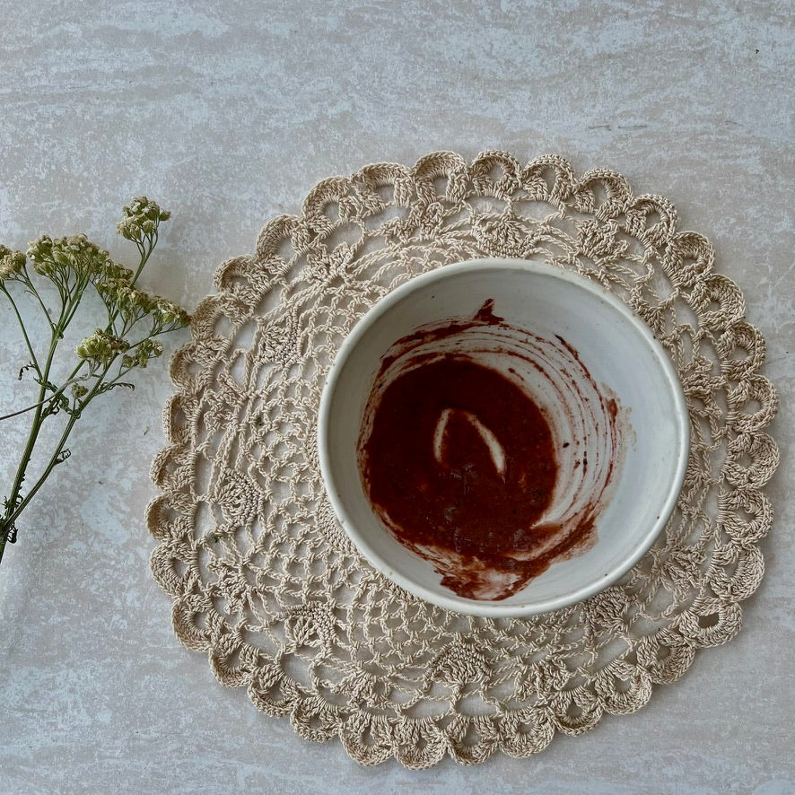 Botanical exfoliant with hibiscus, rose, and pink clay for radiant skin